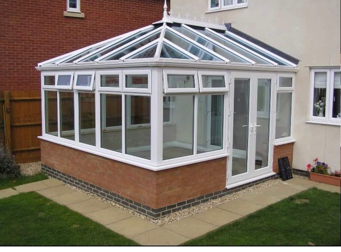 Conservatory extension with large glazed frames